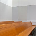 Sound treatment applied to walls within a courtroom