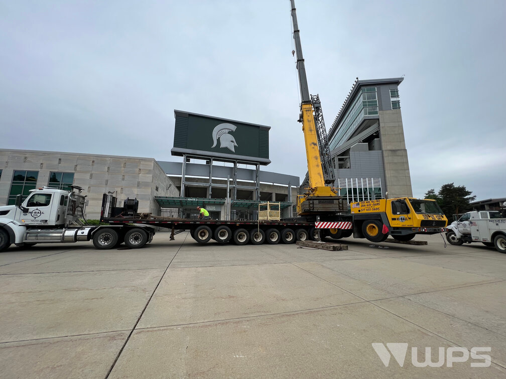 Crane preparing for demolition at Michigan State's Spartan Stadium